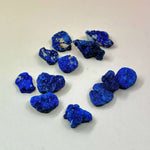 azurite blueberries on pale orange background