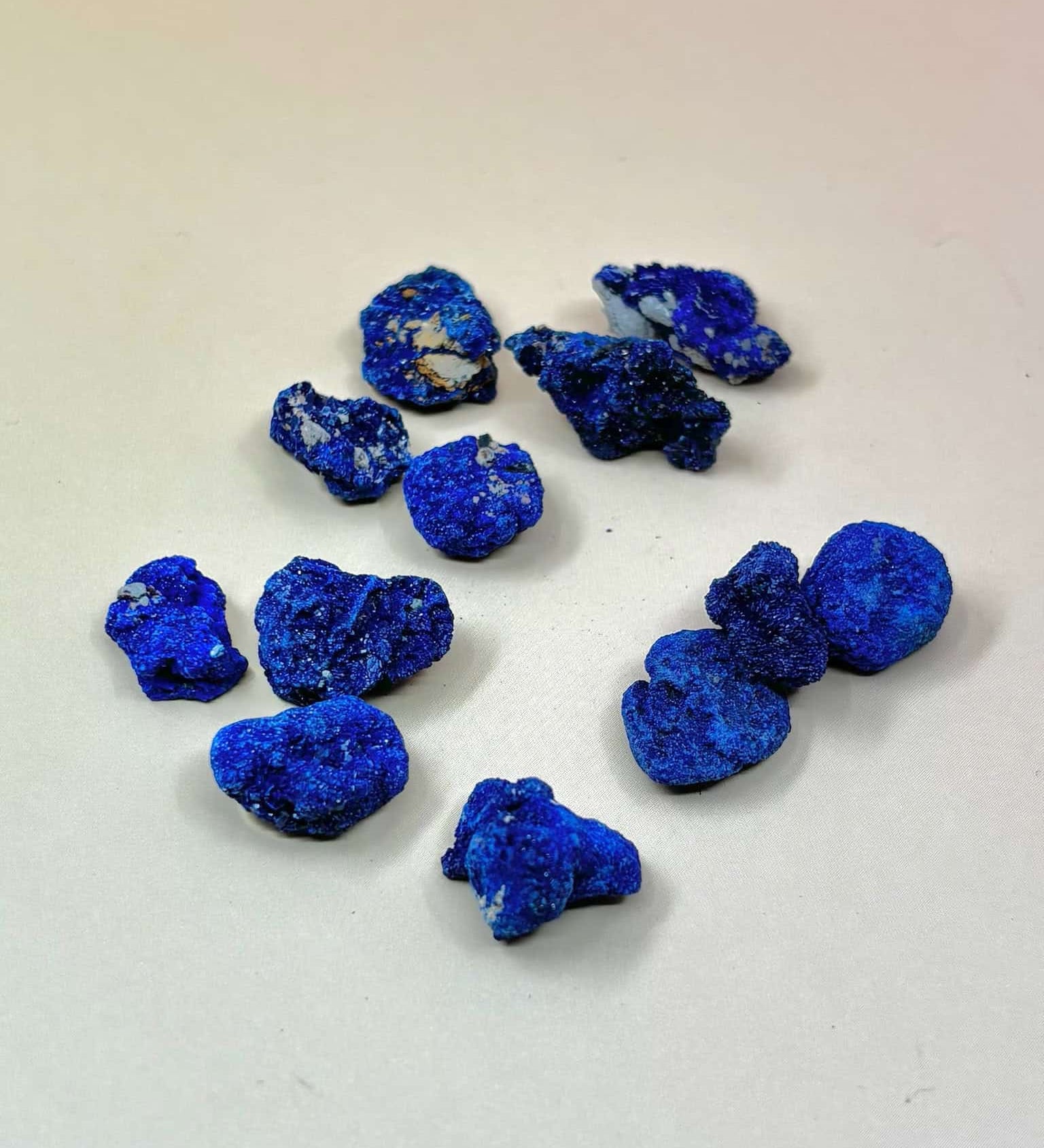 azurite blueberries on pale orange background