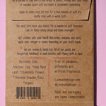 The back of the Deep Pore Cleansing Clay Mask on a pink background.