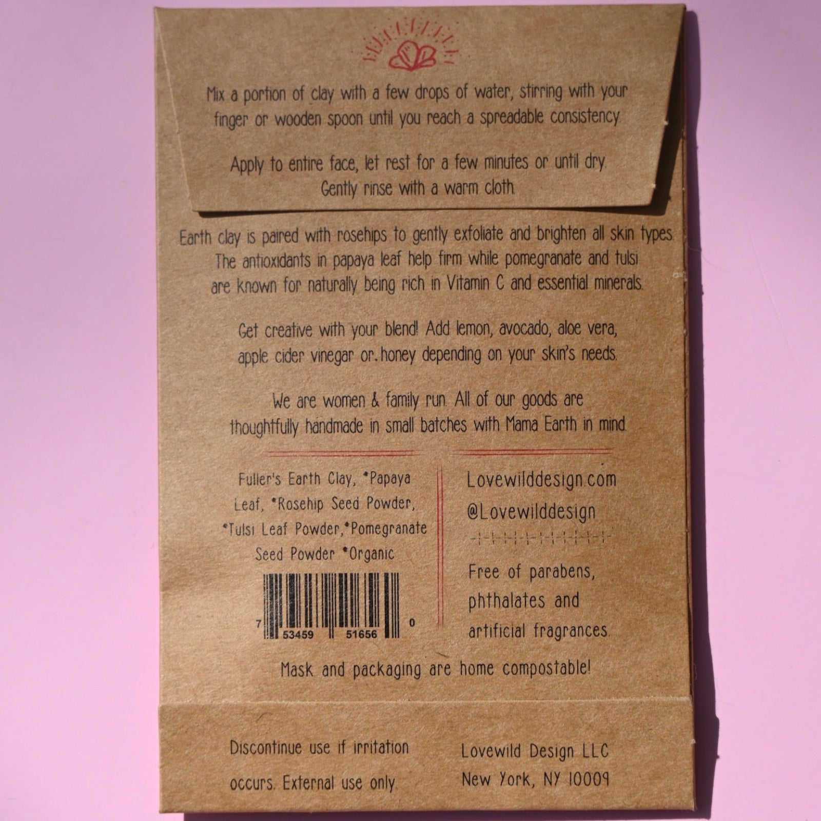 The back of the Gleaming Glow Clay Face Mask on a pink background.