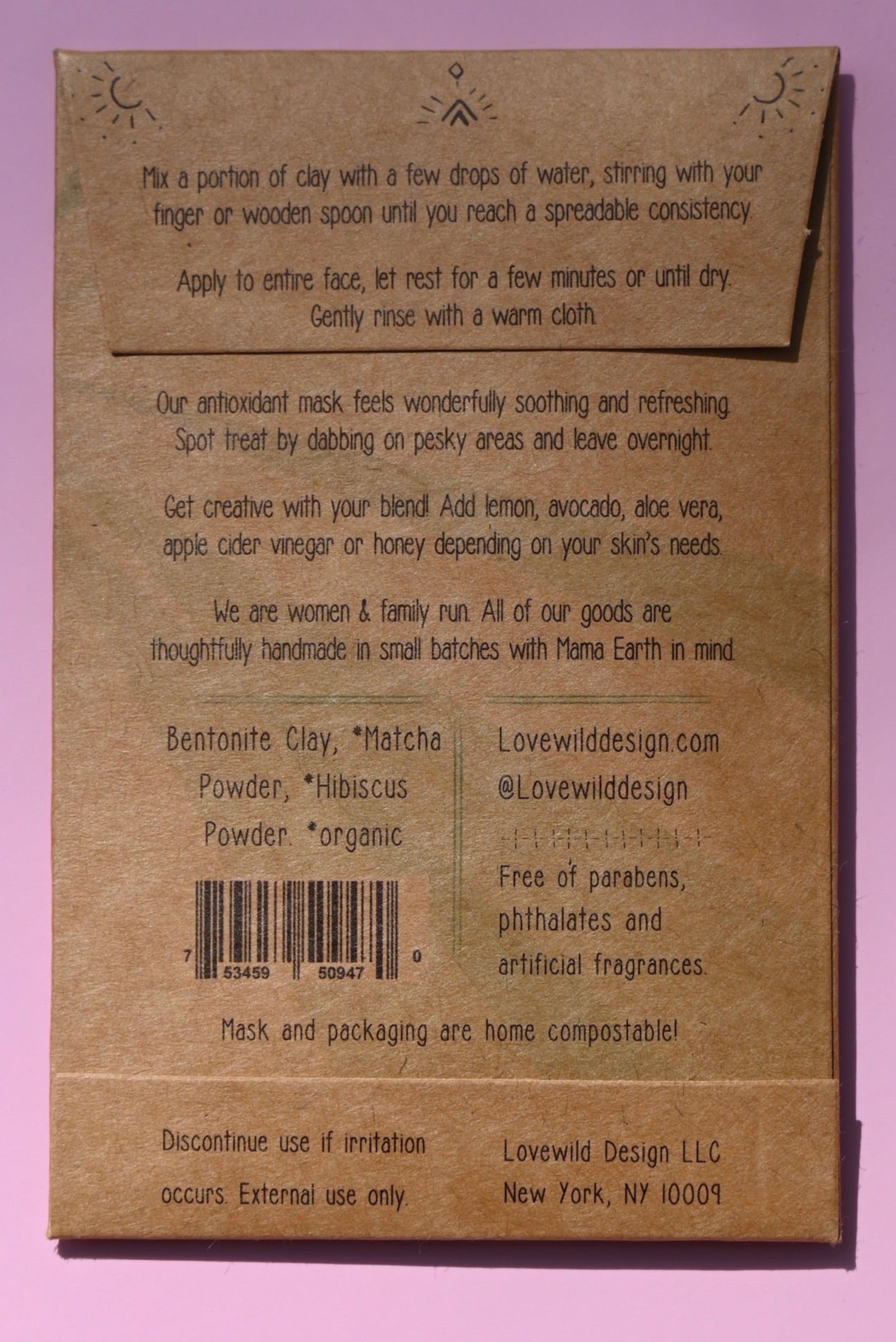 The back of the Antioxidant Mask on a pink background.