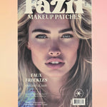 The Faux Freckles Makeup Patches on a pink background.