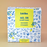 The Amalfi Coast Shower Steamers - 4 Pack Shower Steamers on a pink background.