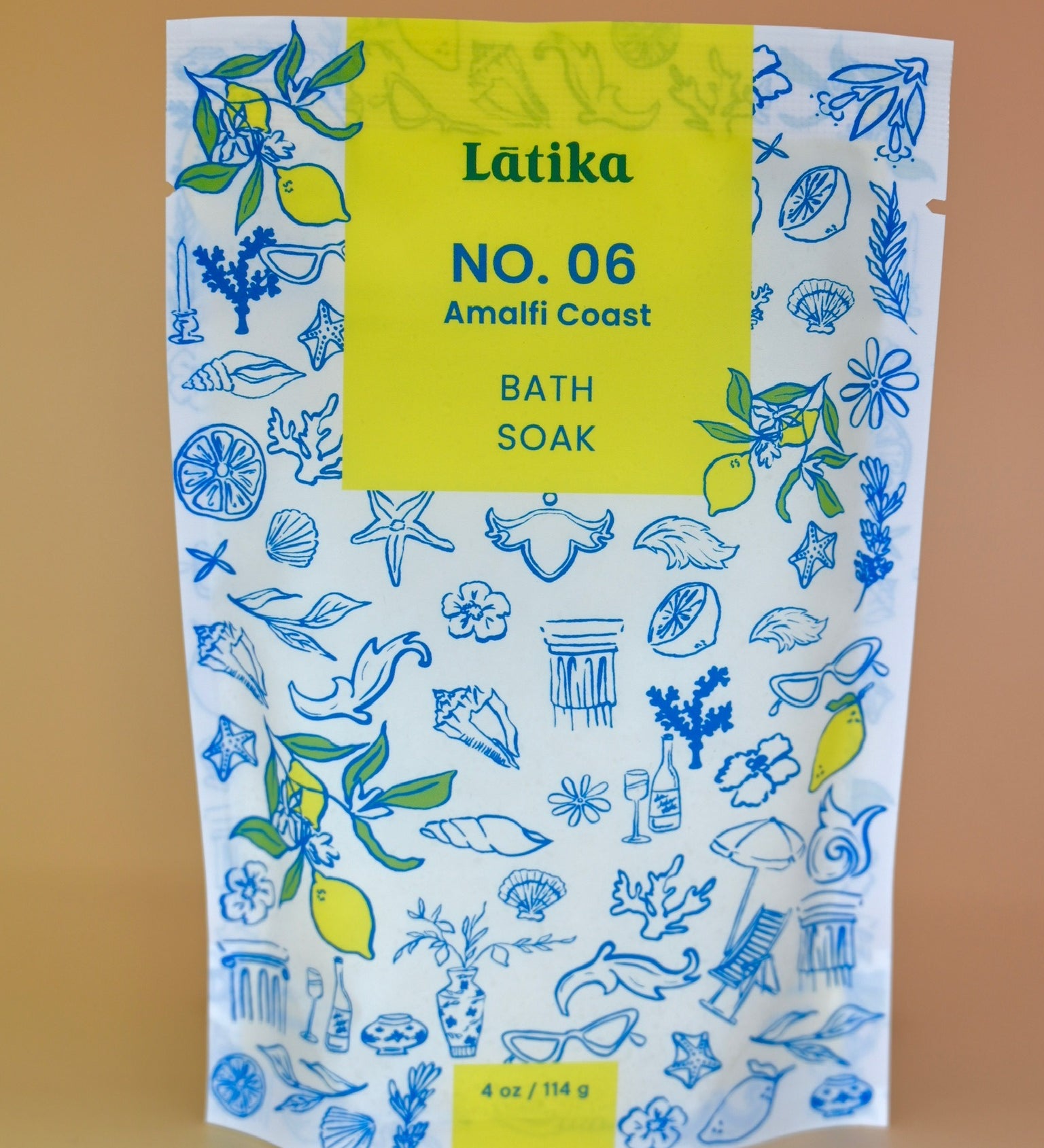 The Amalfi Coast Vegan Milk Bath Soak on a dusty pink background.