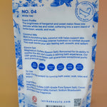 The back of the White Tea Milk Bath Soak on a dusty pink background.