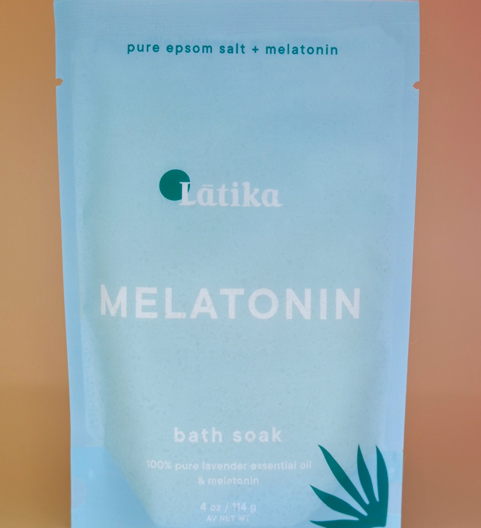 The Melatonin Bath Soak for Sleep Assist on a dusty pink background.