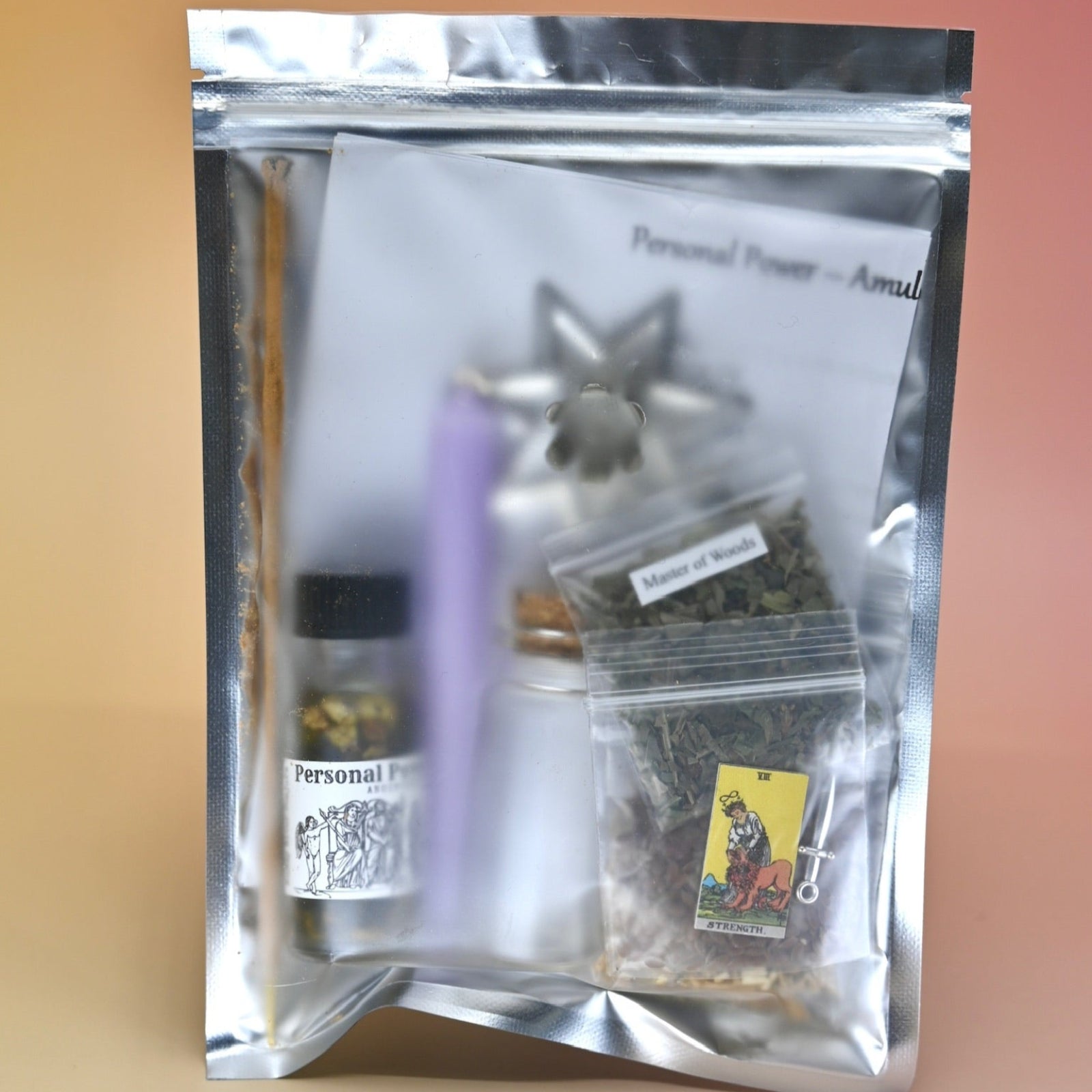 The back of the Personal Power Ritual and Bottle Spell Amulet Kit on a pink and yellow background.