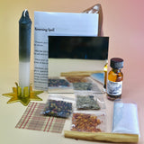 The Send It Back Reversing Spell Kit - Reversing Ritual Kit on a pink and yellow background with its contents out as well.