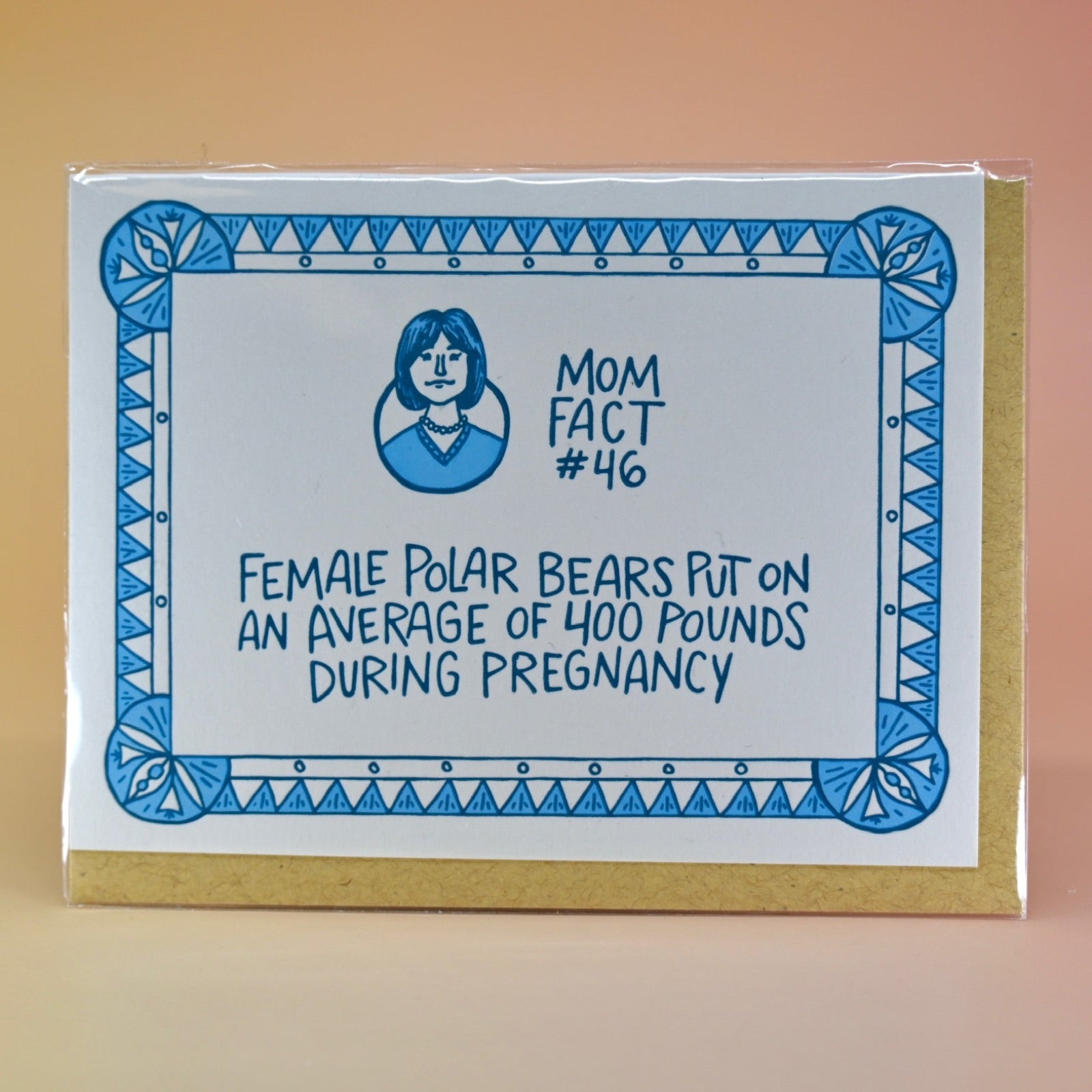 The Mom Fact #46 Pregnancy Congratulations Greeting Card on a peach colored background.
