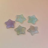 Crystal Gemstone Stars on pale orange background