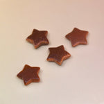 Crystal Gemstone Stars on pale orange background