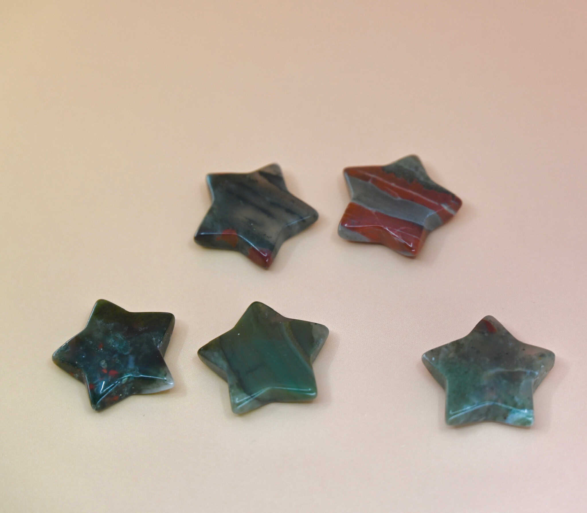 Crystal Gemstone Stars on pale orange background