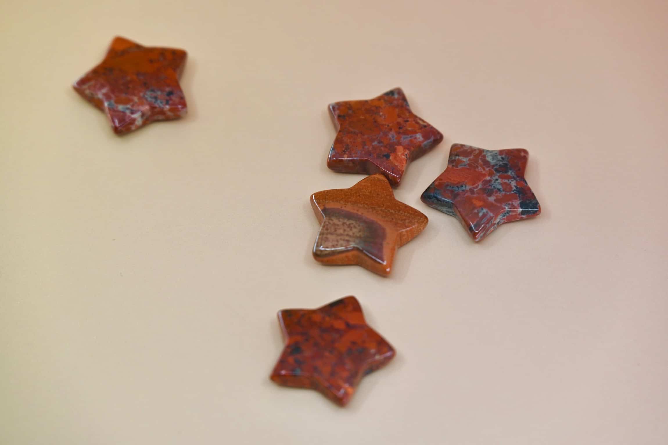 Crystal Gemstone Stars on pale orange background