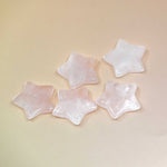 Crystal Gemstone Stars on pale orange background