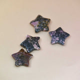 Crystal Gemstone Stars on pale orange background