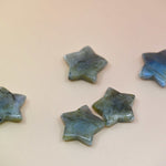 Crystal Gemstone Stars on pale orange background