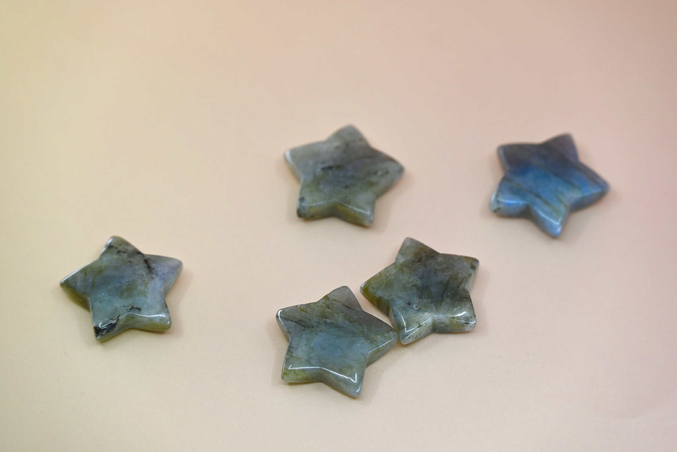 Crystal Gemstone Stars on pale orange background