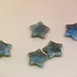 Crystal Gemstone Stars on pale orange background