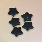 Crystal Gemstone Stars on pale orange background