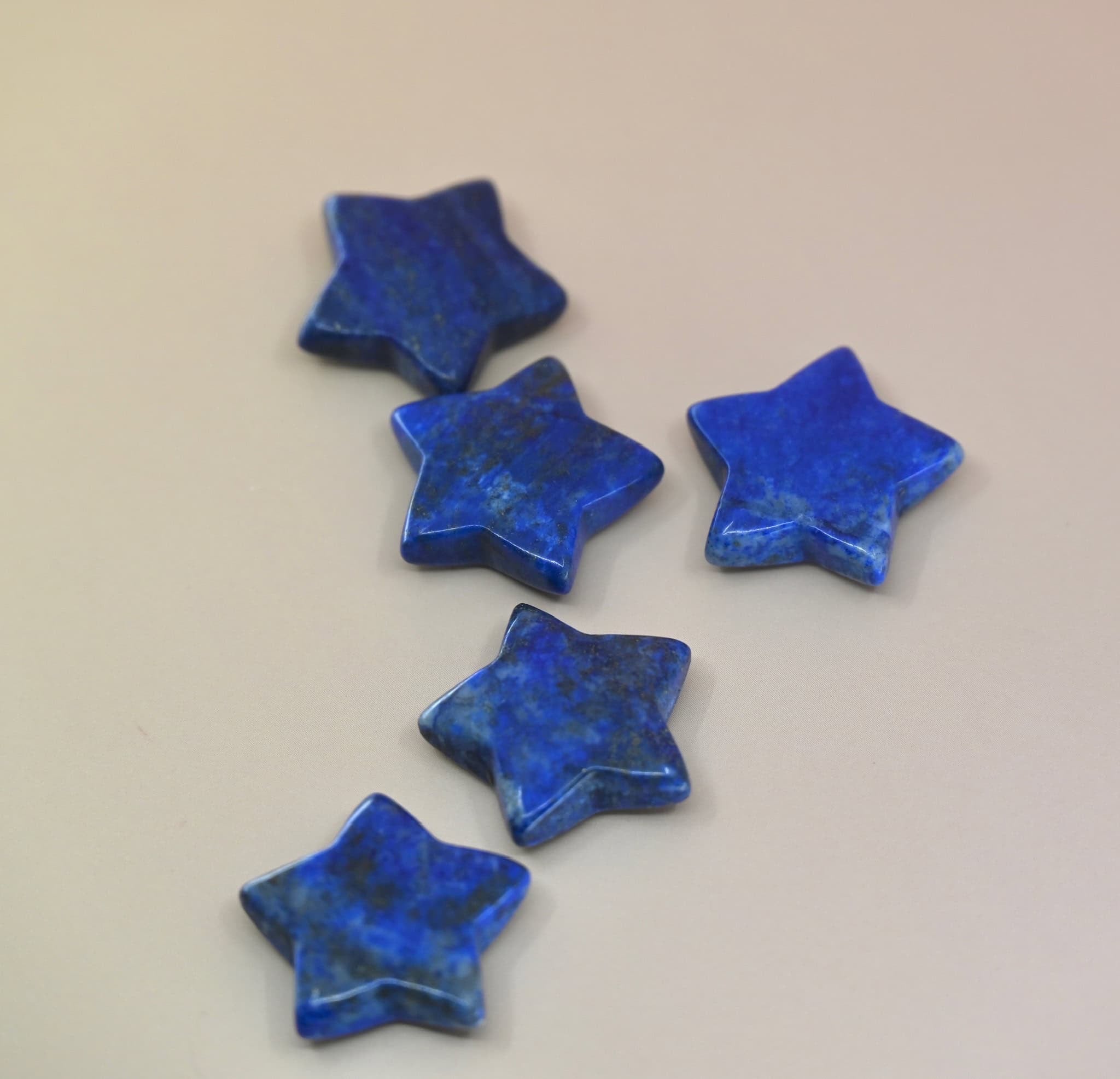 Crystal Gemstone Stars on pale orange background