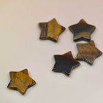 Crystal Gemstone Stars on pale orange background