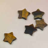 Crystal Gemstone Stars on pale orange background