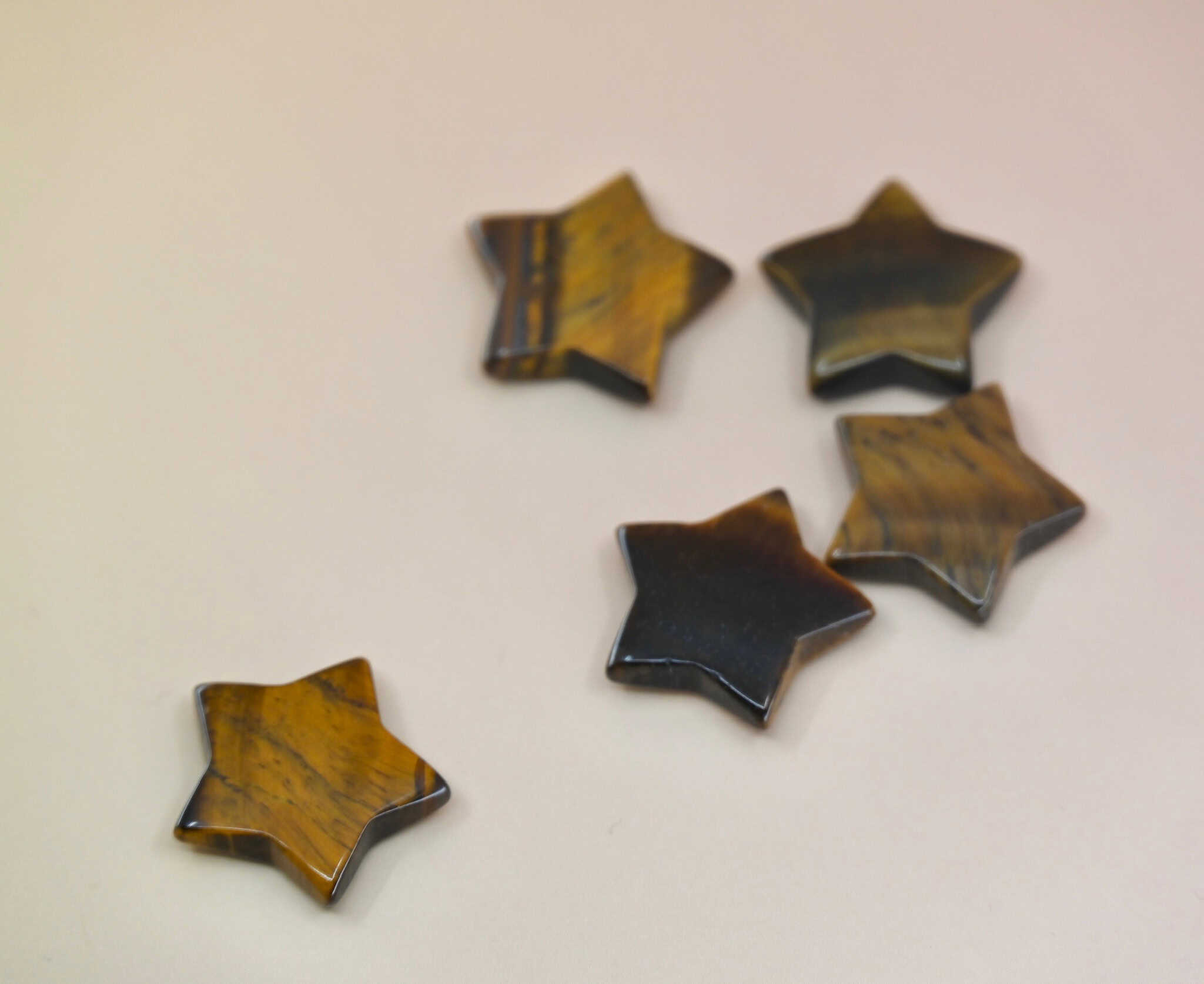 Crystal Gemstone Stars on pale orange background