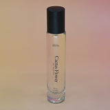 The Cactus Flower 15ml Unisex Eau de Parfum Travel Sprayer on light pink background.