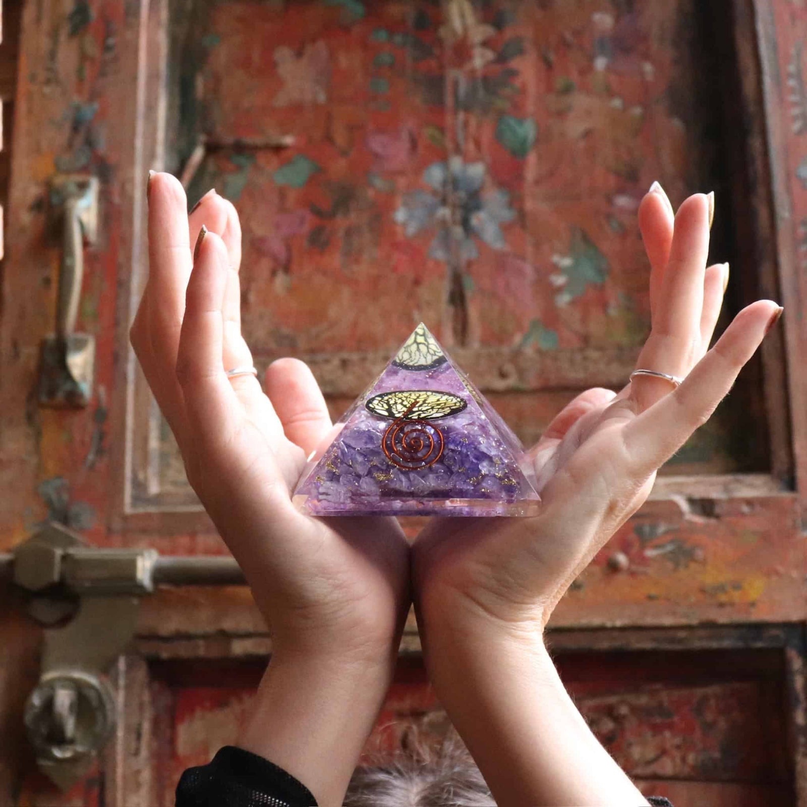 Purple dyed agate orgone pyramid with tree of life symbol