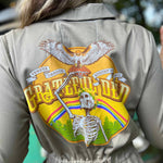 Person wearing a jacket with a colorful graphic design on the back