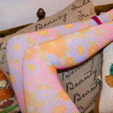 Someone wearing the Retro 1960s Pink & Green Flower Power Tights.