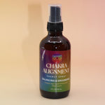 The Chakra Alignment Organic Crystal Charged Energy Spray on a pink and yellow background.