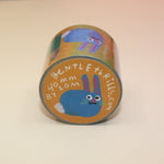 The Colorful Bunnies Washi Tape on a pink and yellow background.