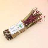 The Rosemary Smoke Cleansing Bundle on a pink and yellow background.