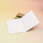 The Have A Wicked Birthday Card open and its envelope on a pink and yellow background.