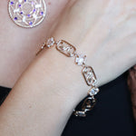 Someone wearing the Fae Crystal Gold Brass Bracelet.