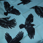 The Crows Cotton Bandana laid out showing off the pattern.
