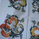 The Tomato Ivory Cotton Bandana laid out showing off the design.