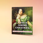 The Have a Serene Christmas Card on a pink and yellow background.