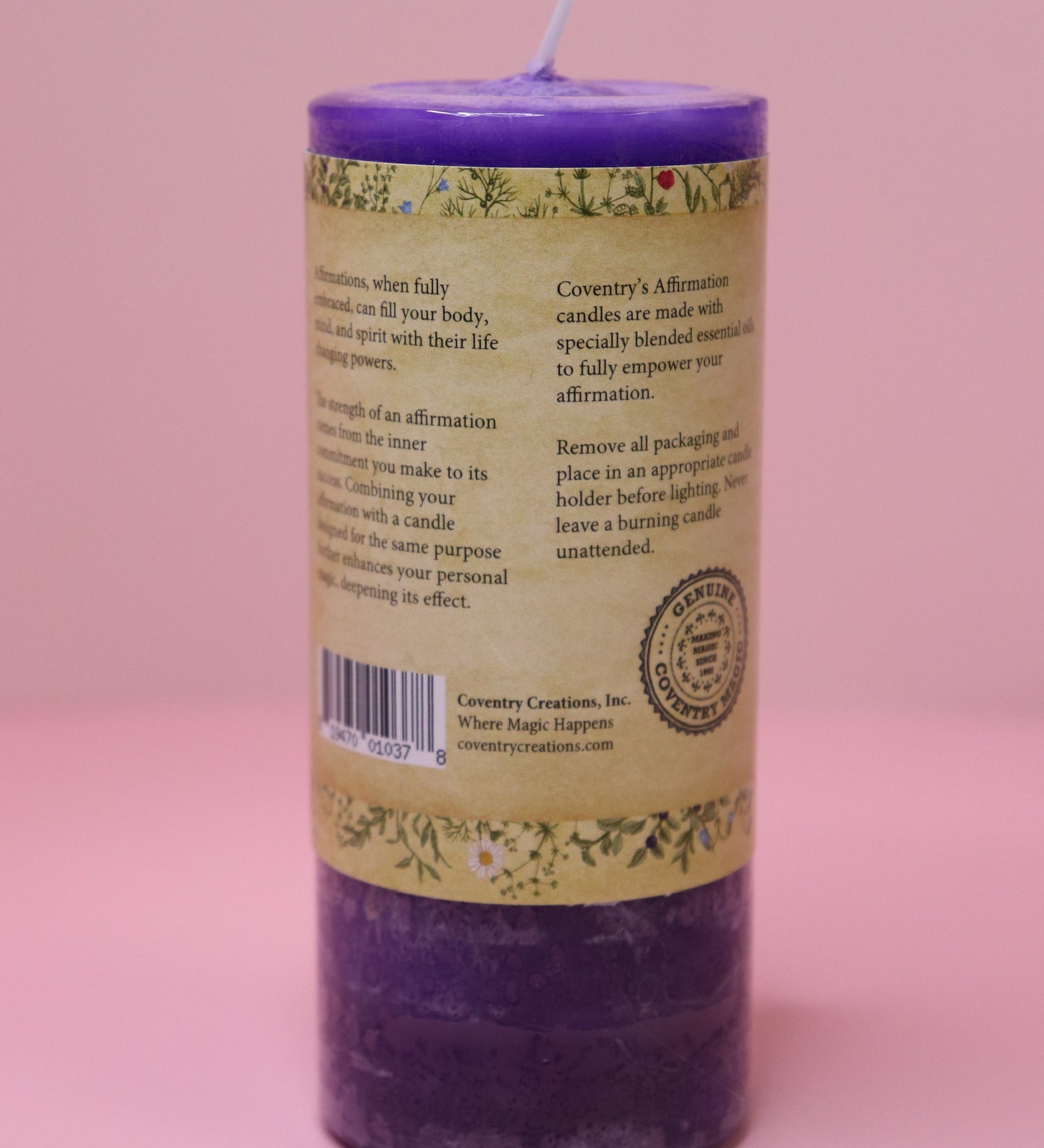 The back of the Affirmation Healing - Pillar Candle with Honeysuckle & Cedar on a pink background.