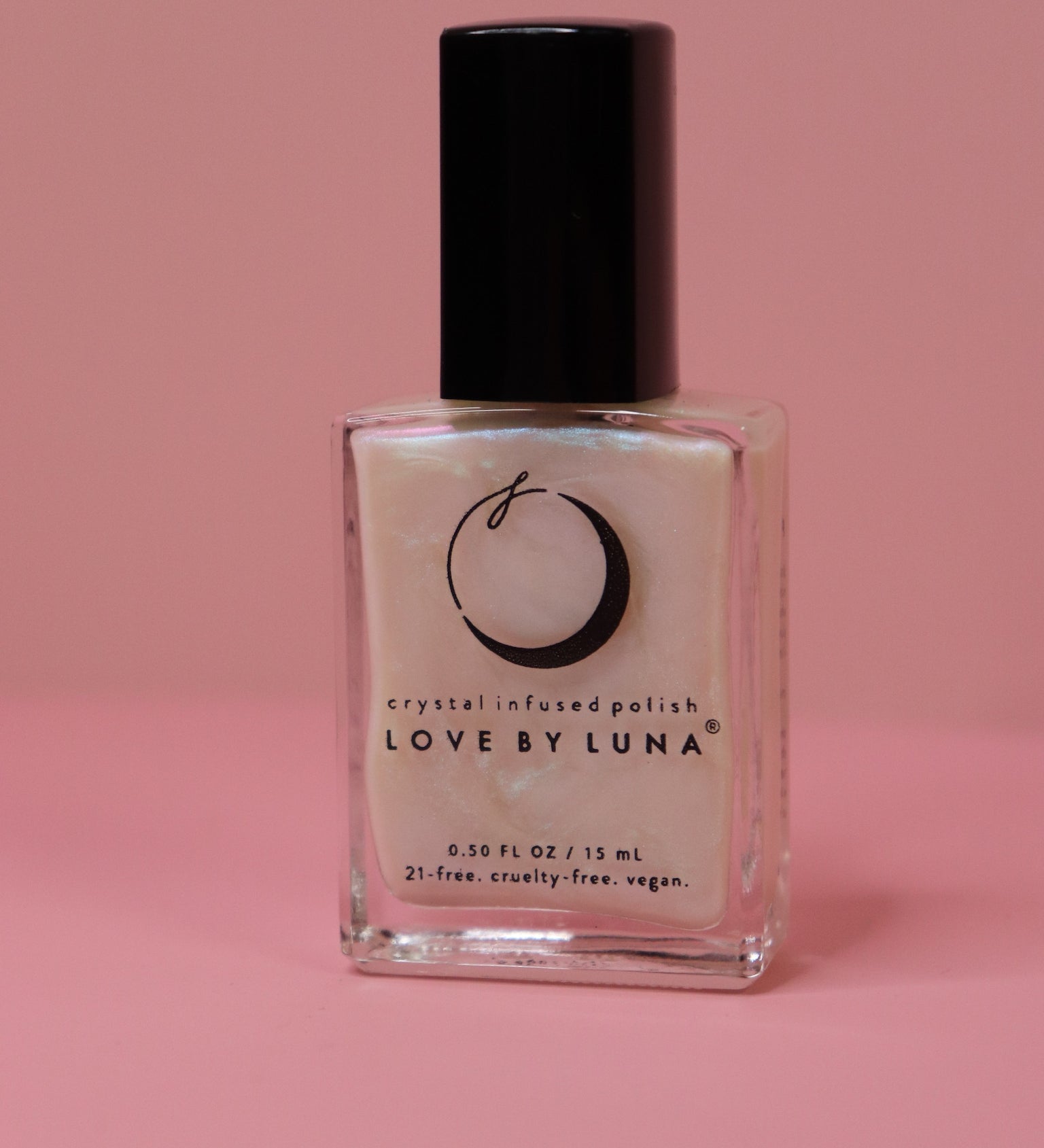 The Full Moon Nail Polish on a pink background.