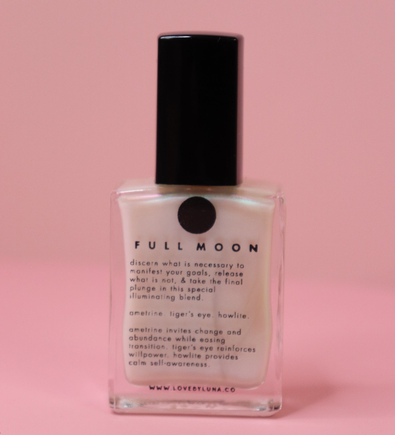 The Full Moon Nail Polish on a pink background.