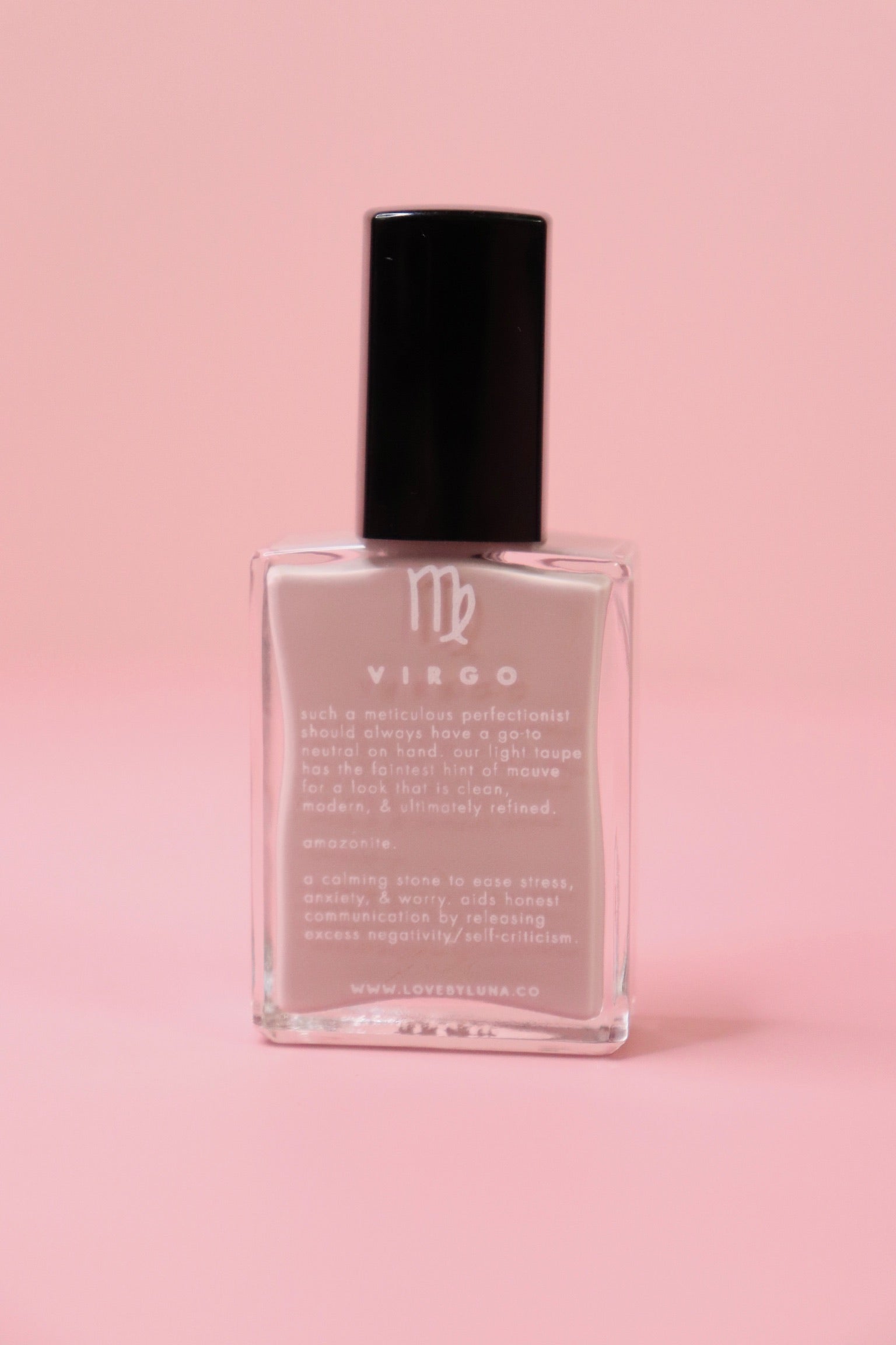The Virgo Zodiac Nail Polish with Micronized Amazonite on a pink background.