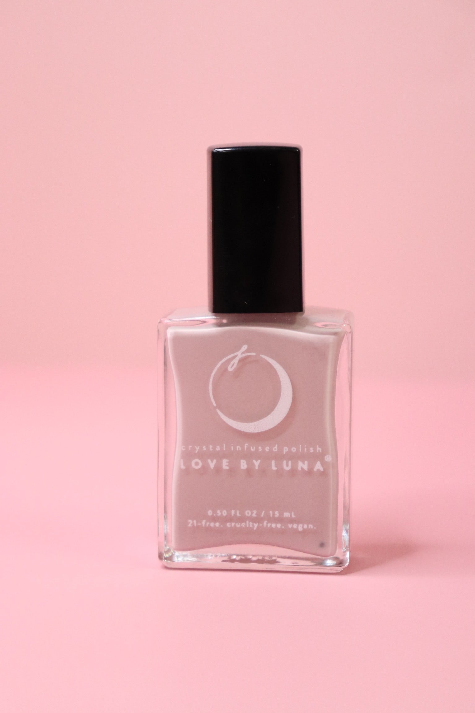 The Virgo Zodiac Nail Polish with Micronized Amazonite on a pink background.