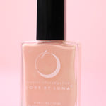 The Taurus Nail Polish on a pink background.