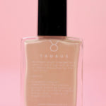The Taurus Nail Polish on a pink background.