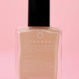 The Taurus Nail Polish on a pink background.
