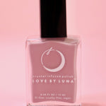 The Chill Pill Nail Polish on a pink background.