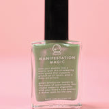 The Manifestation Magic Nail Polish with Micronized Green Aventurine on a pink background.