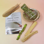 The contents of the 'Soul Sticks' Smudging Starter Kit with Guide and Rosemary Sage on a pink and yellow background.